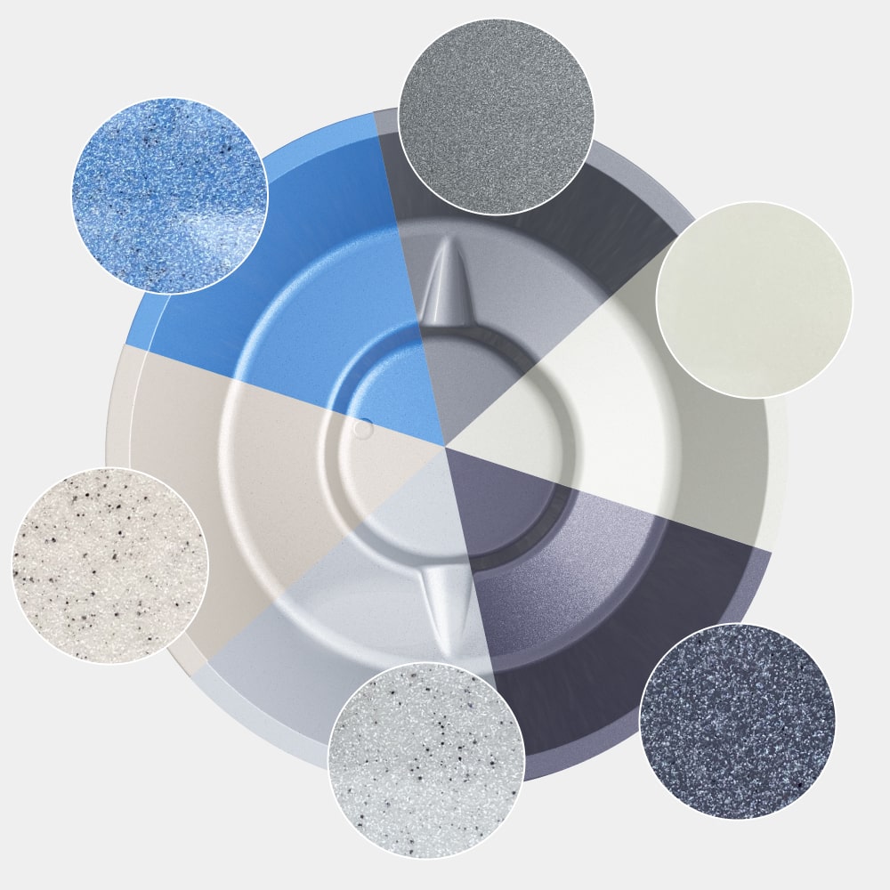 Top-down view of circular color palette showing seven textured paint or coating samples in neutral and blue tones