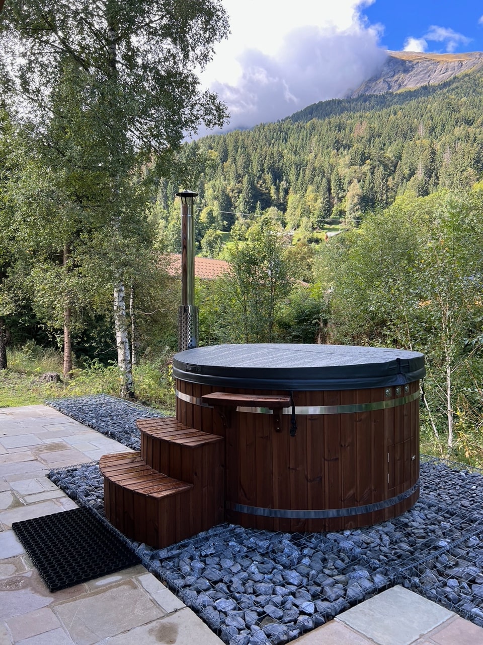 Gardenvity hot tub in a mountain garden – customer photo