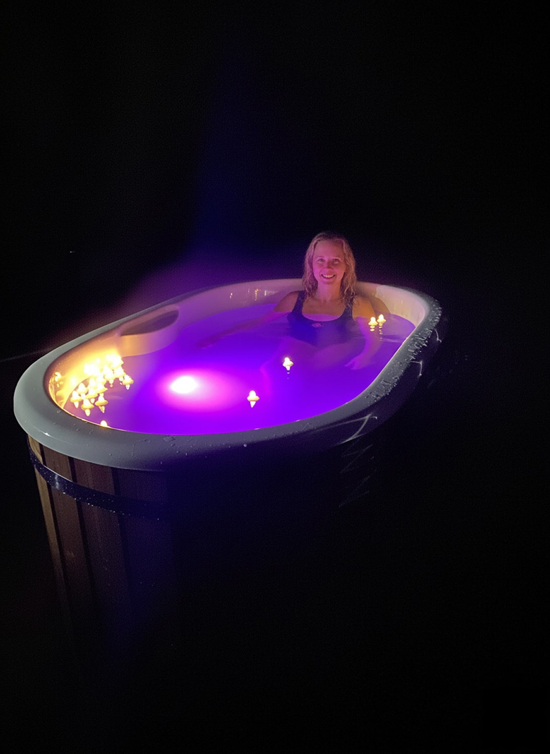 Gardenvity wood fired hot tub Ofuro with night lighting and cozy backyard ambiance